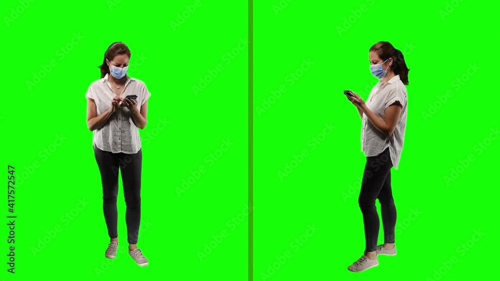 Vidéo Stock Girl Using Smartphone Wearing Face Mask On Green Screen