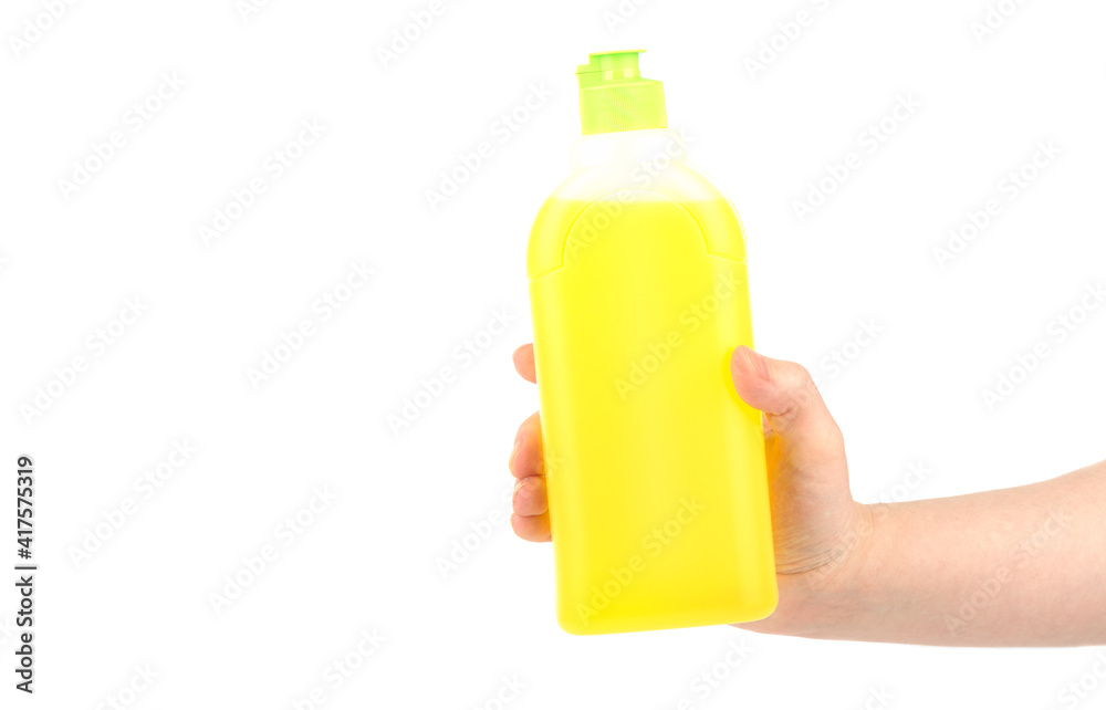 Female hand with a plastic bottle with a chemical substance. Female hand with a plastic bottle with a chemical substance.