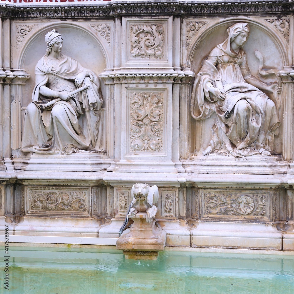 Siena fountain. Tuscany traveling - Tuscan landmarks.