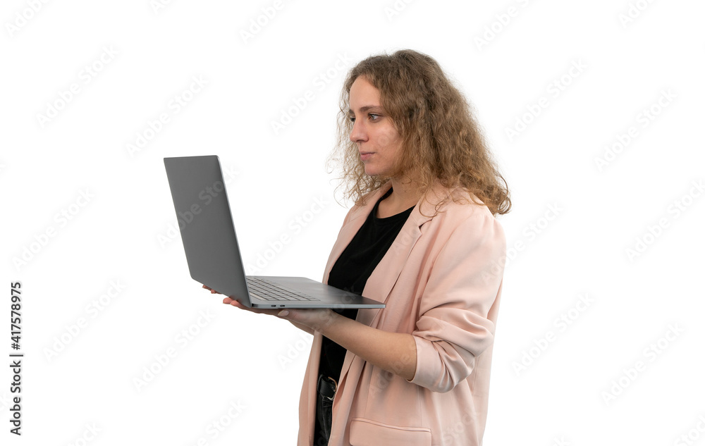 Business woman with curly blonde hair is holding a laptop on white background. Business woman with curly blonde hair is holding a laptop on white background.
