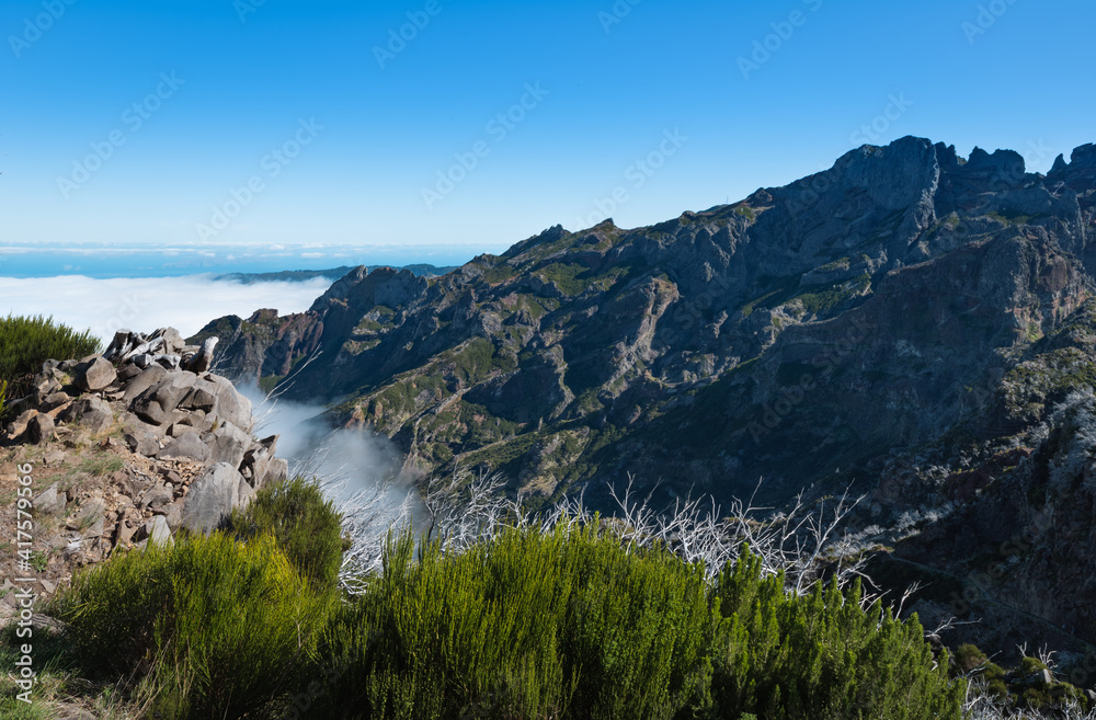 Trekking from Pico do Arieiro to Pico Ruivo, Madeira island, Portugal. Beautiful mountain view.