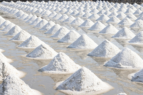 Pile of  pyramid sea salt  ready for harvest in salt farm   that is produced by the evaporation of seawater