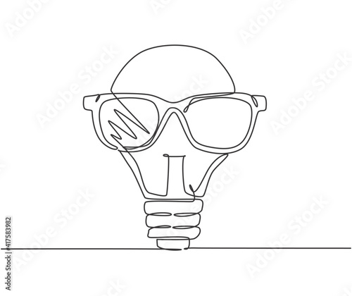 One single line drawing of bright light bulb with trendy sun glasses logo identity. Cool character logotype icon template concept. Dynamic continuous line draw design graphic vector illustration