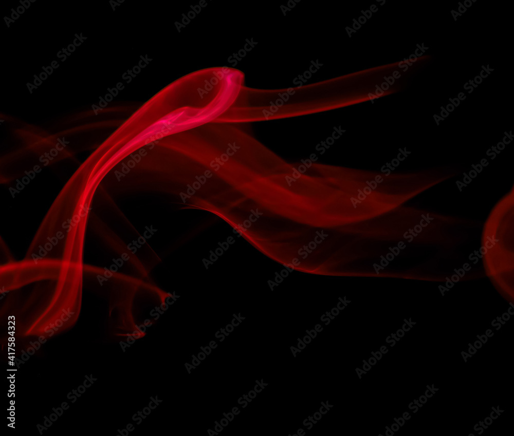 swirling movement of red smoke group, abstract line Isolated on black background swirling movement of red smoke group, abstract line Isolated on black background