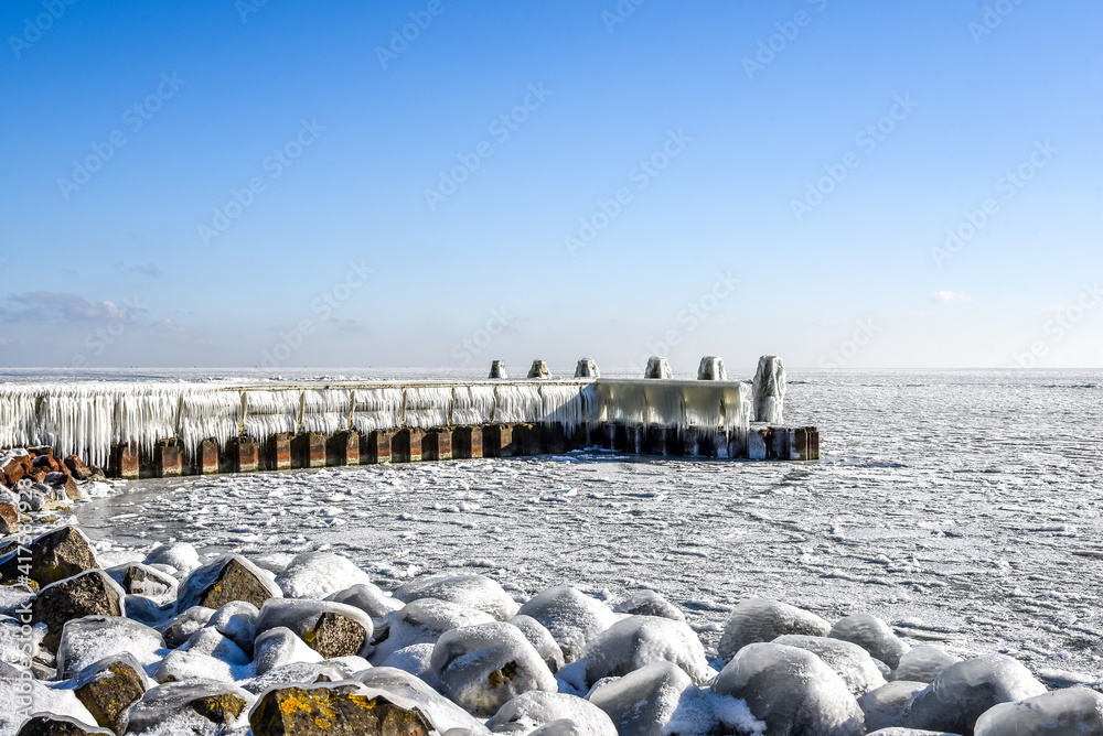 Ice accretion on one of the jetties of the Afsluitdijk, Netherlands.