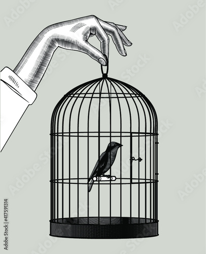 Female hand holding a cage with a bird. Vintage engraving stylized drawing. Vector illustration 