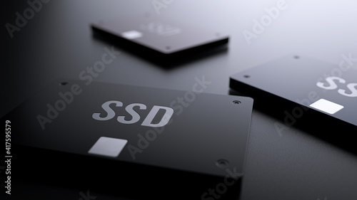 Solid State Drive - SSD Concept, Three SSD On Black Background And Selective Focus, 3d Rendering photo
