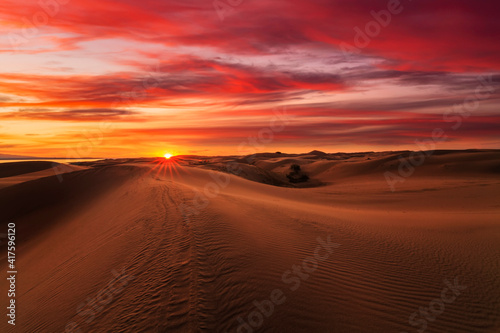 Beautiful sunset over the sand dunes in the Arabian Empty Quarter Desert, UAE. Rub' al Khali