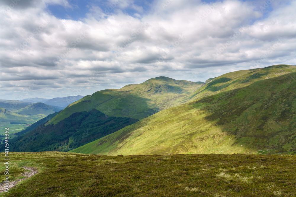 The mountain summits of Meall Garbh, Carn Gorm, An Sgor and crags of Creag Ghlas above Glen Lyon in the Scottish Highlands, UK landscapes.