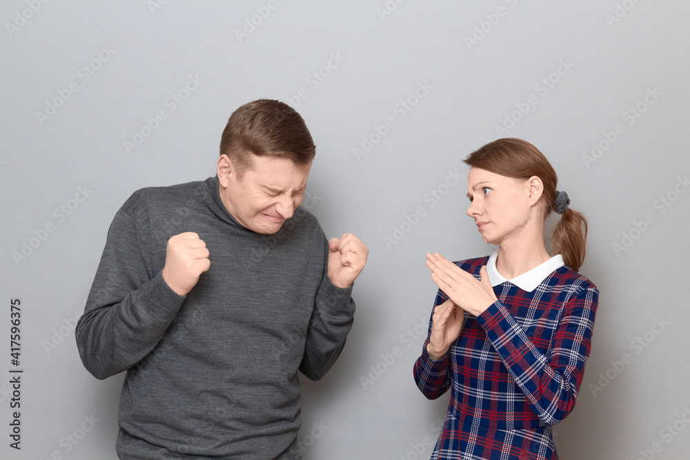Portrait of couple talking, quarrelling, arguing emotionally Portrait of couple talking, quarrelling, arguing emotionally