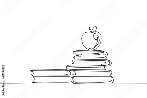 Continuous one line drawing of apple above books stack minimalist vector illustration design on white background. Isolated simple line modern graphic style. Hand drawn graphic concept for education