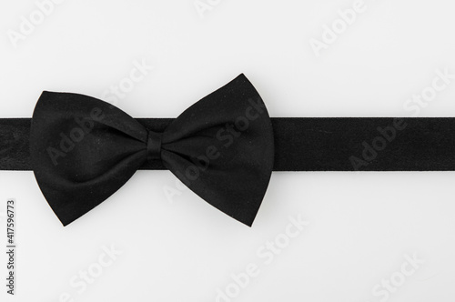 black ribbon bow on white background