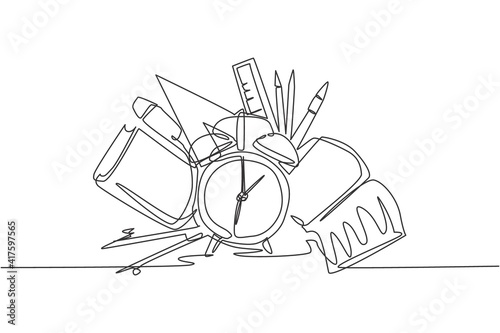 Single continuous line drawing of alarm clock with book, pencil, pen, ruler, compass set. Back to school minimalist style. Education concept. Modern one line draw graphic design vector illustration