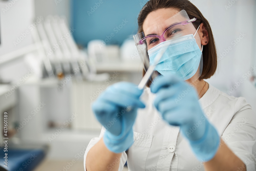 Dental operation instruments kept by a content dental professional Dental operation instruments kept by a content dental professional