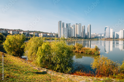Modern skyscrapers and Gwanggyo Lake Park in Suwon, Korea
