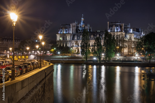 Hotel de Ville, Quai de l'Hotel de ville, Quai aux Fleurs and Parc des Rives de Seine at night. Paris. France