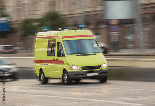 Ambulance car moves around the city