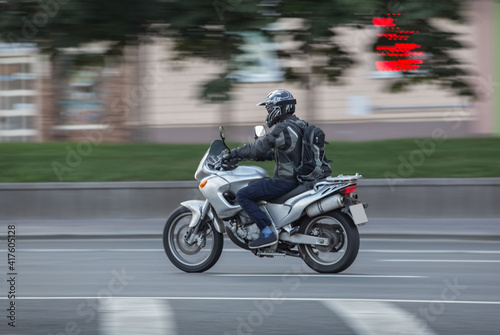 motorcyclist on a motorcycle moves