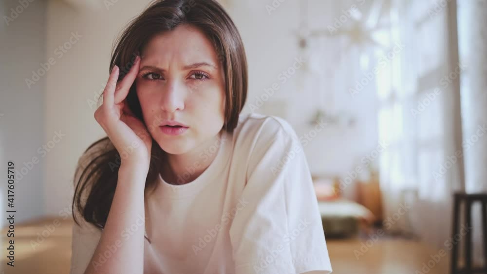 Tired of work is a young woman. Burnout in business. Overloading information Tired of work is a young woman. Burnout in business. Overloading information