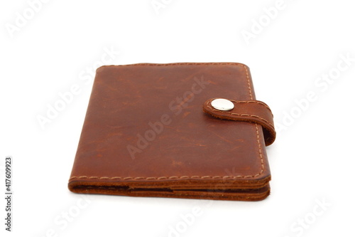 leather brown wallet on a white background