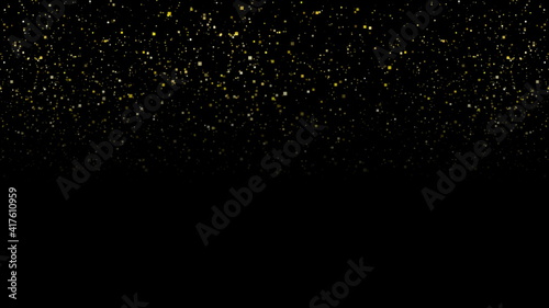 Abstract golden glowing dust particles background