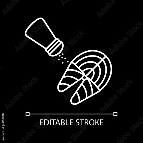 Pouring salt on fish steak white linear icon for dark theme. Cooking salmon. Seasoning tuna. Thin line customizable illustration. Isolated vector contour symbol for night mode. Editable stroke