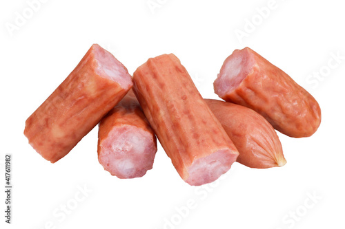 pieces sousages isolated in a white background. Meat, haunting sousages  photo