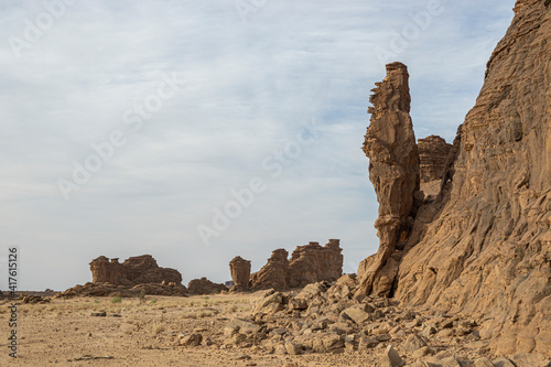 Early morning light drapes the eroded desert formation  The Ennedi Plateau  Chad  Africa