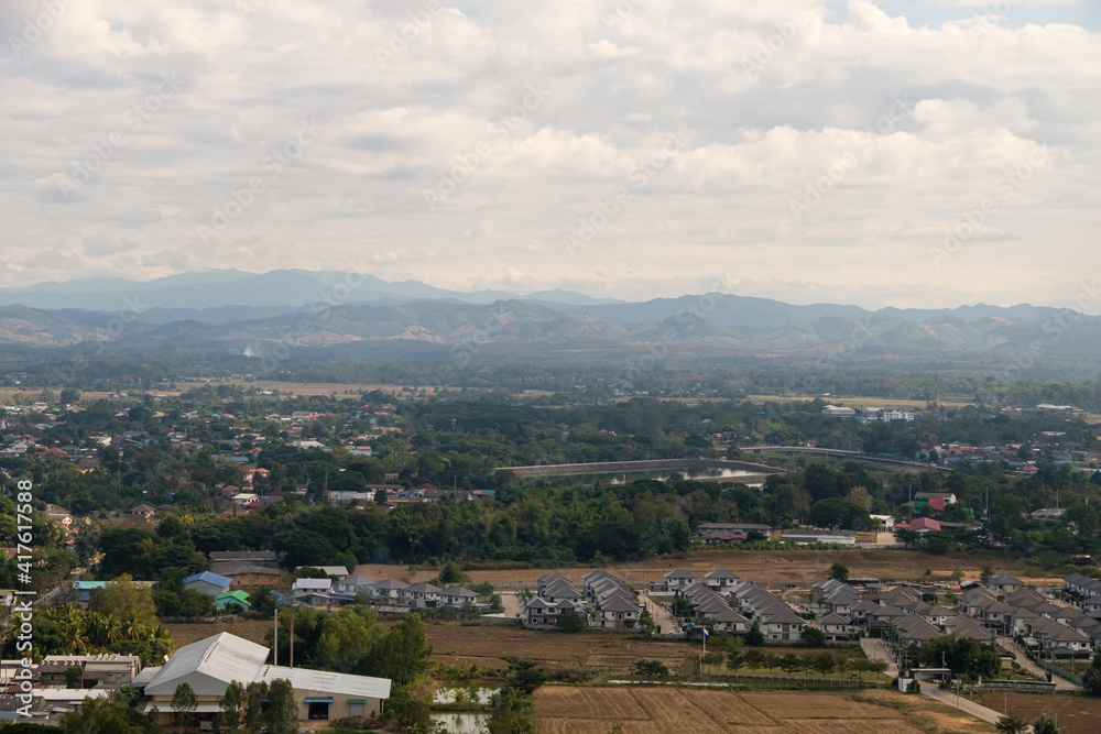 View of the small town which is located in the plains between the mountains range.