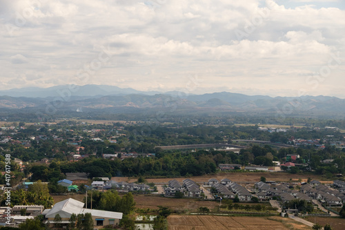 View of the small town which is located in the plains between the mountains range.