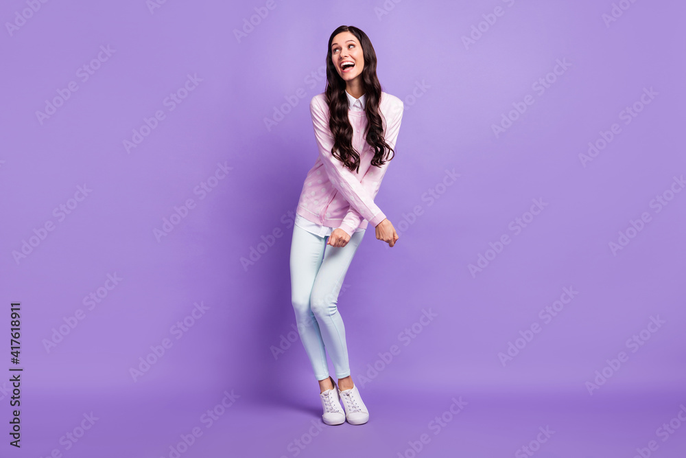 Full length body size view of pretty amazed cheerful wavy-haired girl dancing having fun fooling isolated on violet color background
