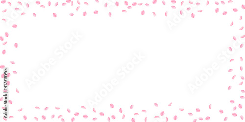 Sakura petals falling down. Romantic pink silky small flowers. Sparse flying cherry petals. Wide sca