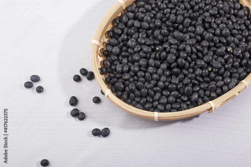 uncooked black beans isolated on the white background. uncooked black beans isolated on the white background.