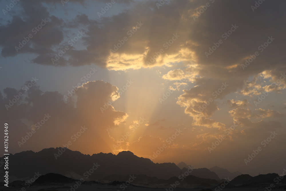 sunrise over the mountains. sunset over the desert. Scenic view of a highway. beautiful landscape in pastel colors.