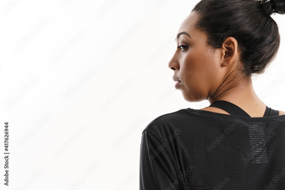 Confident african american woman posing in profile Confident african american woman posing in profile