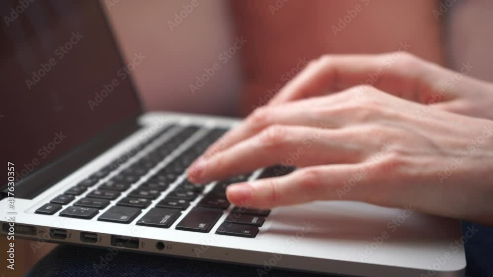 Female hands of business woman, professional user using text input on laptop keyboard, sit at home office table, working online with pc applications technology concept, close up, top view Female hands of business woman, professional user using text input on laptop keyboard, sit at home office table, working online with pc applications technology concept, close up, top view