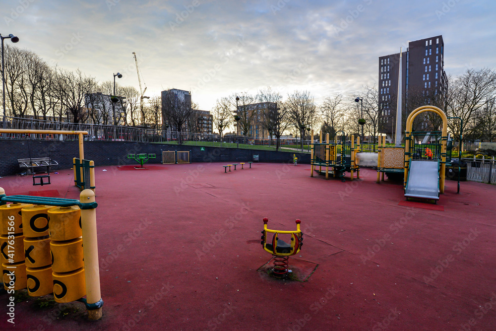 An empty playground just after sunrise