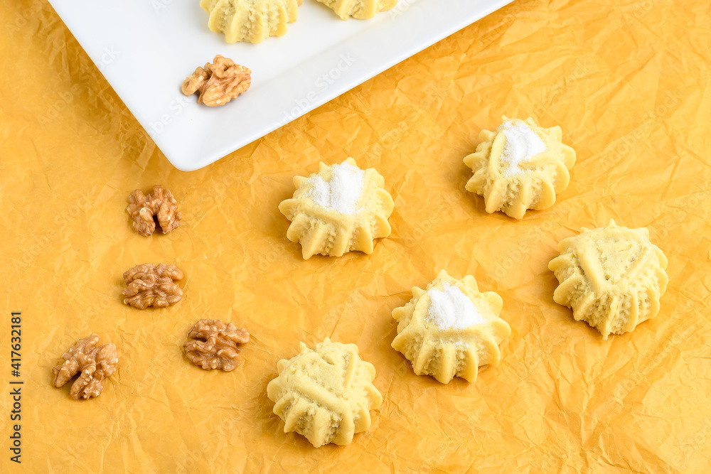 mahmoull a typical arabic sweet isolated on yellow background mahmoull a typical arabic sweet isolated on yellow background