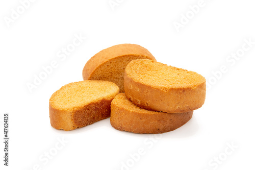 a piece of brown bread biscuit isolated on a white background