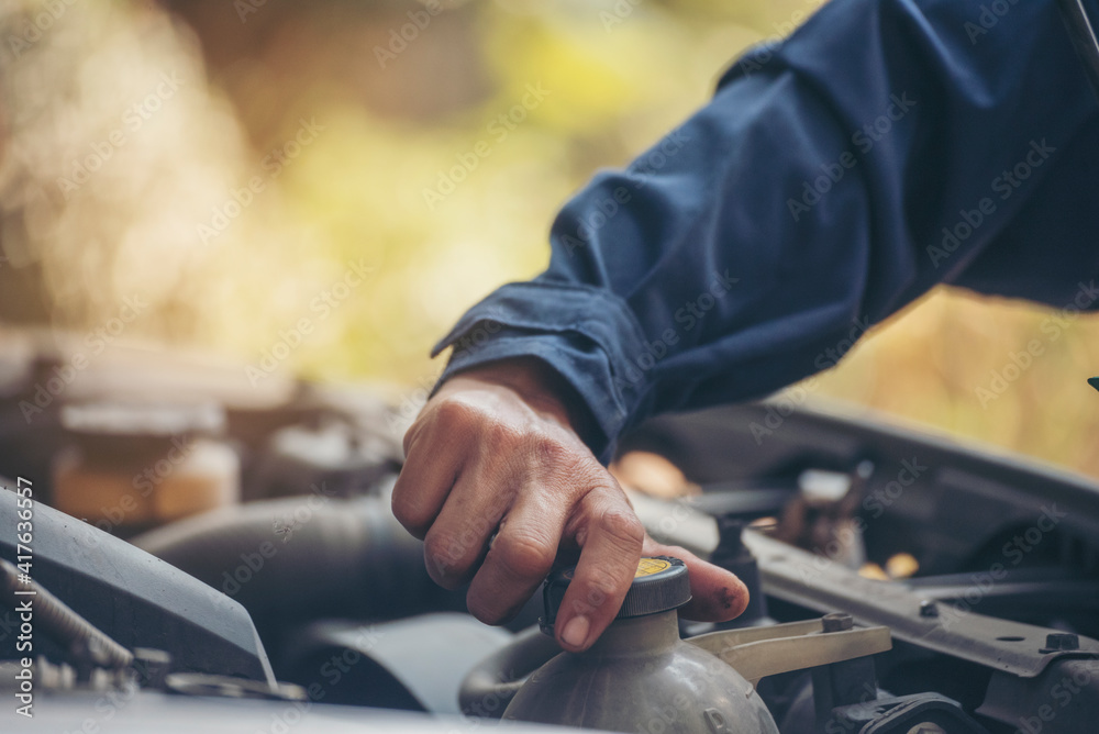 Mechanic car service auto garage in automotive mobile center. Technician workshop repair engine motor vehicles service mechanical engineering business. Automobile mechanic hands car repairs technic Mechanic car service auto garage in automotive mobile center. Technician workshop repair engine motor vehicles service mechanical engineering business. Automobile mechanic hands car repairs technic