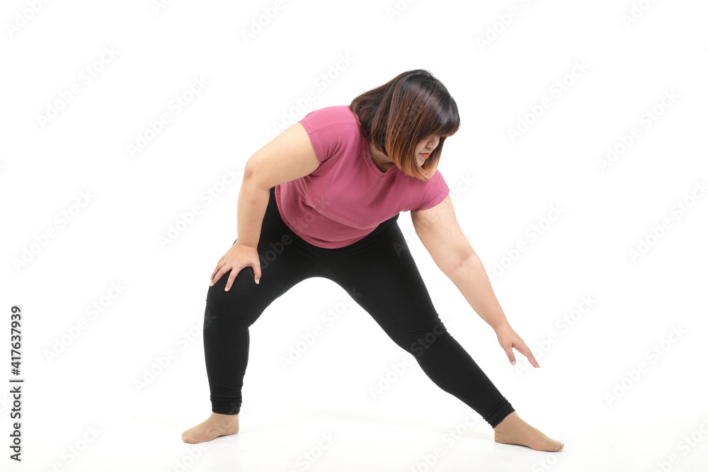 Fat Asian woman exercising Do stretches of arms and legs. Stay on a white background. The concept of losing weight, fat burning, exercise for staying healthy. isolated Fat Asian woman exercising Do stretches of arms and legs. Stay on a white background. The concept of losing weight, fat burning, exercise for staying healthy. isolated