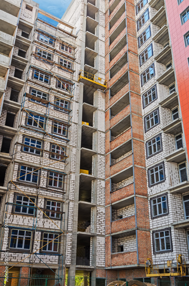 Fototapeta premium Walls of multi-storey building under construction