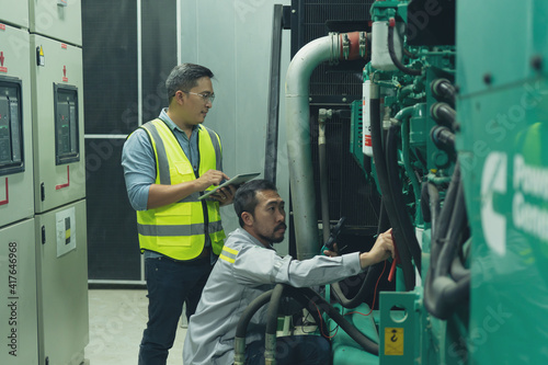 the technician preventive maintenance checking of generator of Industry