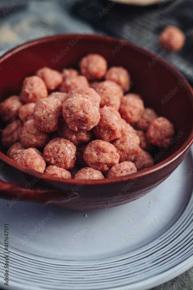 Raw home made Italian traditional meatballs Raw home made Italian traditional meatballs