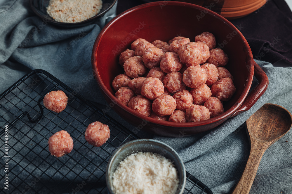 Raw home made Italian traditional meatballs Raw home made Italian traditional meatballs
