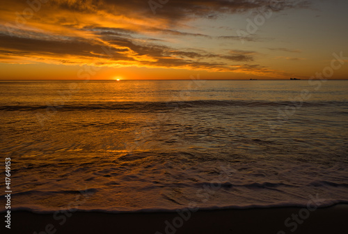 A beautiful sunrise from the shore of the beach