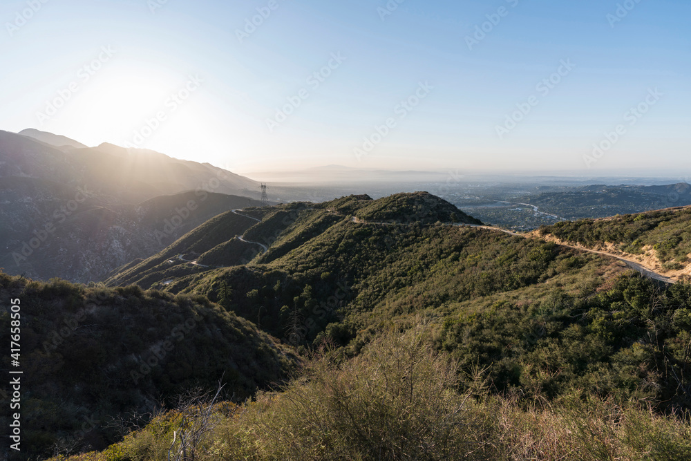 Sunrise view of Mt Lukens Truck Trail fire road and Mt Wilson  in the San Gabriel Mountains near Pasadena and Los Angeles California.  