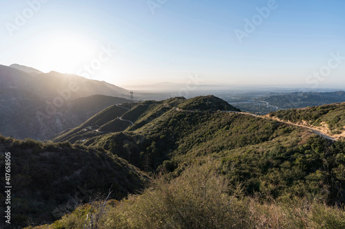 Fototapeta Sunrise view of Mt Lukens Truck Trail fire road and Mt Wilson  in the San Gabriel Mountains near Pasadena and Los Angeles California