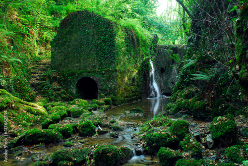 Bolunzulo old mill and waterfall in Kortezubi. Urdaibai Biosphere Reserve. Basque Country. Spain photo