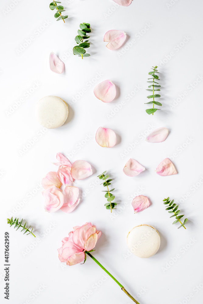 spring pattern with macaroons and flower in soft light top view spring pattern with macaroons and flower in soft light top view